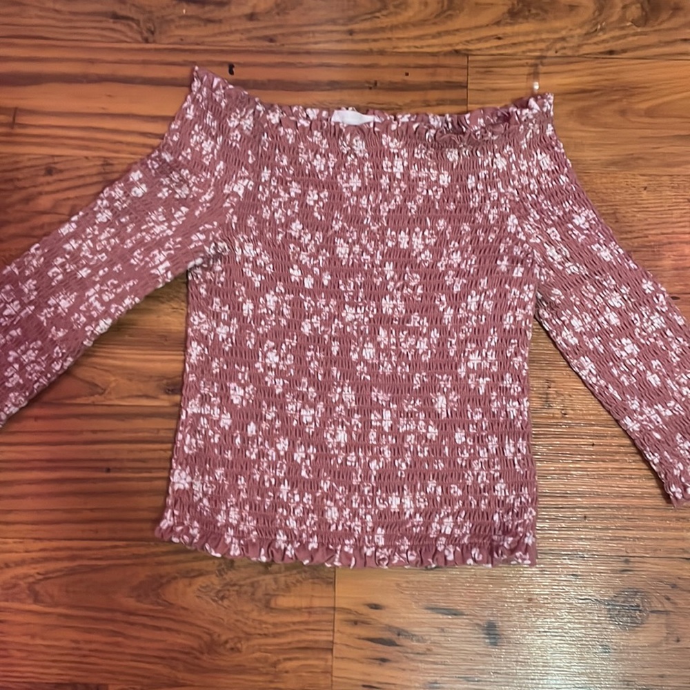 Off the shoulder half sleeved runs a little small